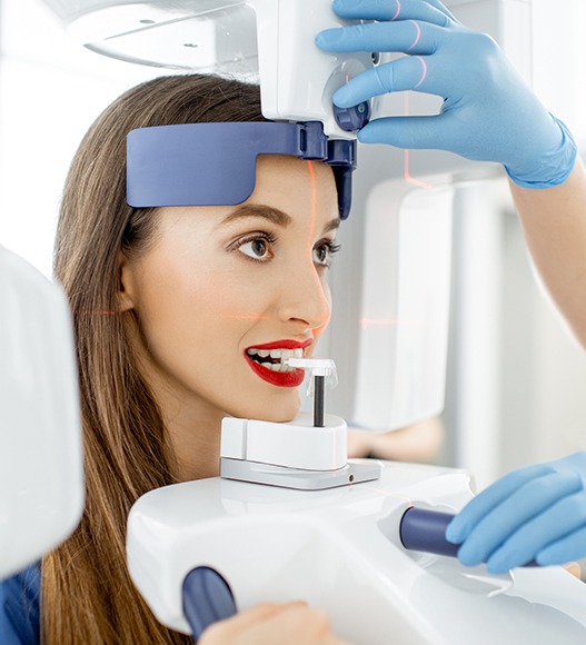 Woman receiving 3 D cone beam imaging treatment