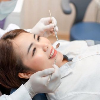 Smiling woman attending dental checkup