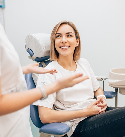 Woman smiling during general dentistry visit