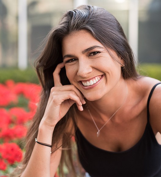 Woman sharing flawless smile after cosmetic bonding