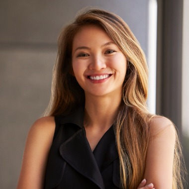 Woman with gorgeous smile after cosmetic dentistry