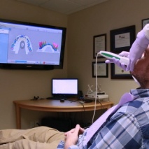 Dentist using advanced dental technology