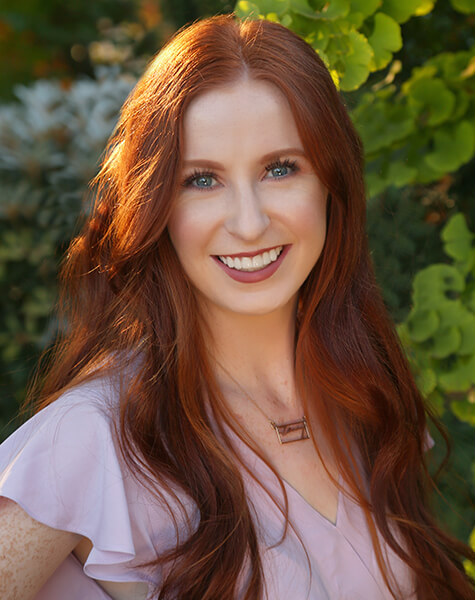 Woman with flawless smile after dental care