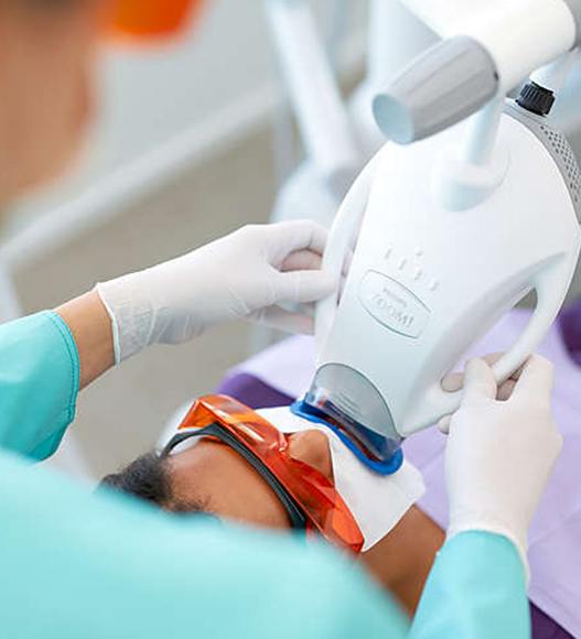 Patient receiving Zoom in office teeth whitening