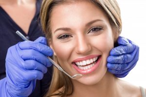 woman smiling happy white teeth dentist