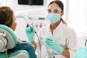 Dentist working on patient.